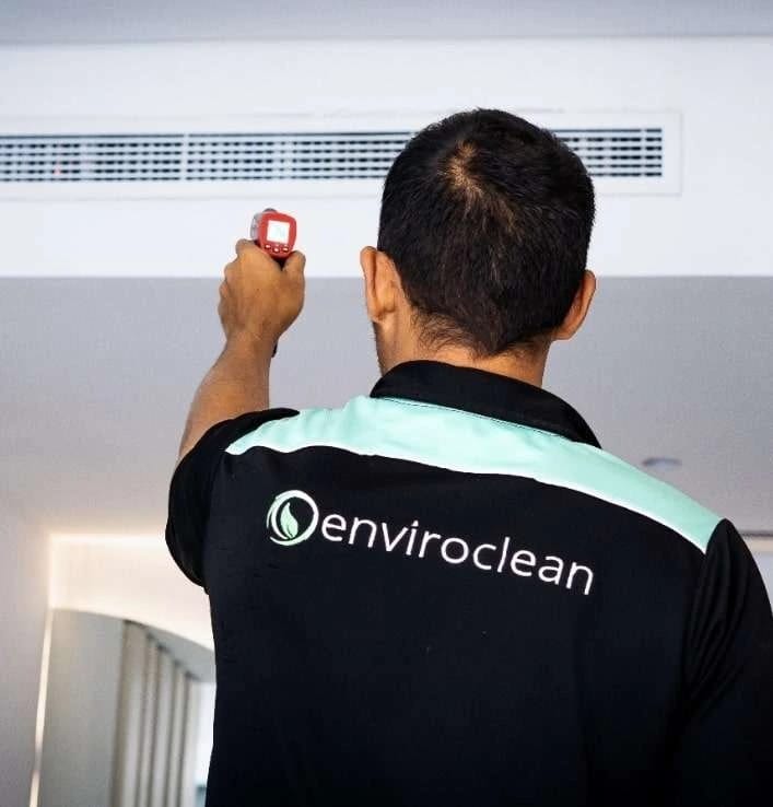 Technician checking AC